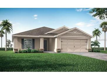 Charming single-story home featuring a two-car garage, well-maintained lawn, and tropical landscaping at 1009 Aruba Ave, Mulberry, FL 33860