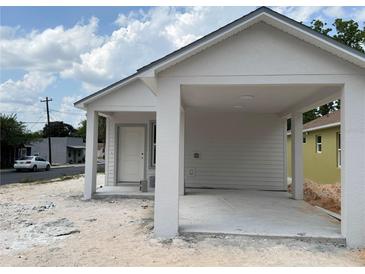New single story home with a carport and gray trim at 629 W 9Th, Lakeland, FL 33805