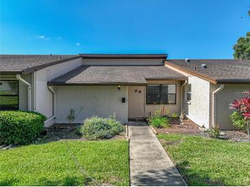 Charming home featuring manicured lawn, garden, and a well-maintained exterior at 2025 Sylvester Rd # P4, Lakeland, FL 33803