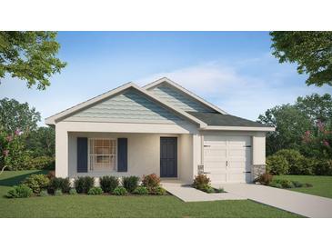 Charming single-story home featuring a well-manicured lawn, stone accents, and a welcoming entrance at 4486 Rapallo Ave, Winter Haven, FL 33884