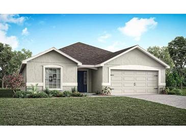 Charming one-story home with a manicured lawn, neutral paint, and a two-car garage at 797 Cypress Creek Run, St Cloud, FL 34771