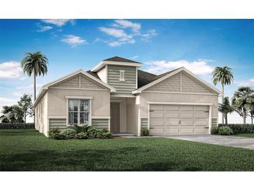 Charming single-Gathering home featuring a two-car garage, well-manicured lawn, and inviting curb appeal at 867 Cypress Creek Run, St Cloud, FL 34771