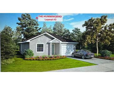 New construction shows charming curb appeal and an attached one car garage and paved driveway at 5914 Cormorant Ct, Lakeland, FL 33809