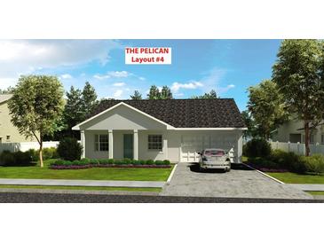 Charming single-story home featuring a neutral palette, well-manicured lawn, and attached garage, perfect for comfortable living at 5920 Cormorant Ct, Lakeland, FL 33809