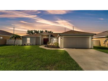 Charming single-Gathering home featuring a well-maintained lawn and two car garage at 3787 Sandhill Crane Dr, Lakeland, FL 33811