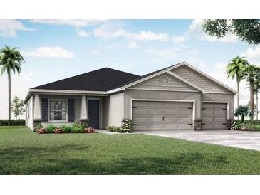 Charming single-Gathering home features a three-car garage, gray facade, and lush landscaping, creating inviting curb appeal at 2228 Summerlake Ct, Auburndale, FL 33823