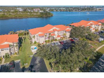 Condo community with water access and lush landscaping at 460 Bouchelle Dr # 304, New Smyrna Beach, FL 32169