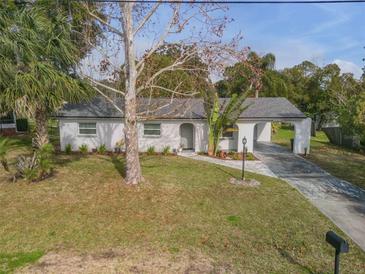 Updated home with a large yard and carport at 1339 N Fowler Dr, Deltona, FL 32725