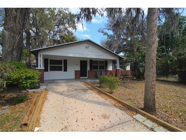 Charming single-story home with a well-kept lawn and welcoming front porch at 349 Fletcher Ave, Daytona Beach, FL 32114