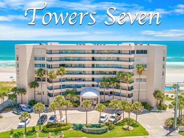 Towers Seven condos featuring ocean views, palm trees, parking, and beach access at 4651 S Atlantic Ave # 604, Ponce Inlet, FL 32127