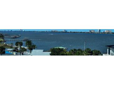 Expansive water view featuring docks and boat houses near a residential community in a coastal city at 2801 S Ridgewood Ave # 512, South Daytona, FL 32119