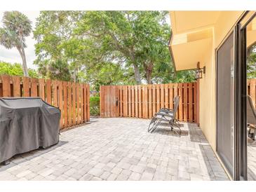 Inviting patio with outdoor seating, ideal for relaxing and entertaining at 3808 Saxon Dr, New Smyrna Beach, FL 32169