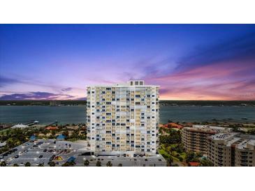 Stunning high-rise building with waterfront views at sunset at 2 Oceans West Blvd # 206, Daytona Beach Shores, FL 32118