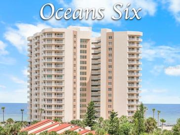 Exterior view of Oceans Six Condo in Daytona Beach Shores, FL, showcasing balconies and beach access at 2967 S Atlantic Ave # 508, Daytona Beach, FL 32118
