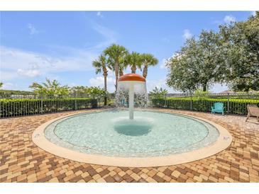 Fun splash pad area with water feature, perfect for to cool off on hot days at 5849 Ansley Way, Mount Dora, FL 32757