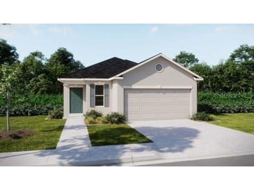 Charming single-story home featuring a two-car garage and beautifully landscaped front yard at 2767 San Marco Way, Winter Haven, FL 33884