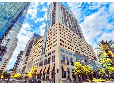 Modern high-rise building showcasing sleek architecture and prime location in the heart of the city at 155 S Court Ave # 1610, Orlando, FL 32801