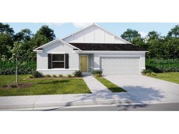 Charming single-story home with a two-car garage, manicured lawn, and neutral color palette at 6646 Rhythm Dr, Mascotte, FL 34753