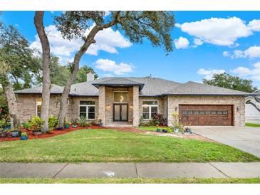 Beautiful home with a landscaped yard and a two-car garage at 250 Shady Oaks Cir, Lake Mary, FL 32746