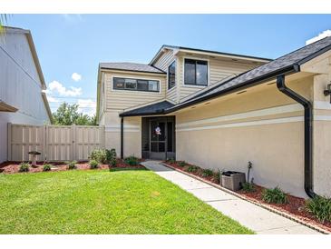 Attractive home with a well-maintained lawn and charming curb appeal on a beautiful sunny day at 337 Goldstone Pl, Lake Mary, FL 32746