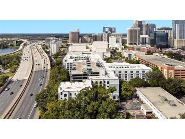 Orlando condominium complex near downtown skyline and major highway, offering urban convenience at 202 E South St # 6042, Orlando, FL 32801
