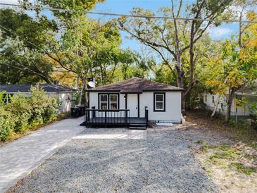 Updated bungalow with new deck, paved driveway, and landscaping at 101 S Glenwood Ave, Orlando, FL 32803