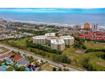 Oceanfront condo building with resort amenities near the beach at 4 Oceans West Blvd # 102C, Daytona Beach Shores, FL 32118