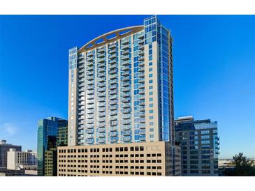 High rise building exterior in a city setting with blue skies at 155 S Court Ave # 2908, Orlando, FL 32801
