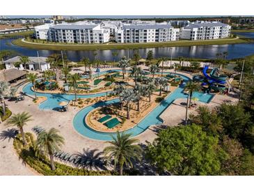 Resort-style pool with waterslide and expansive sundeck at 3171 Paradox Cir # 305, Kissimmee, FL 34746