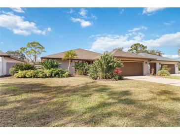 Well-maintained home exterior featuring a large yard at 7 Huntley Ct., Haines City, FL 33844