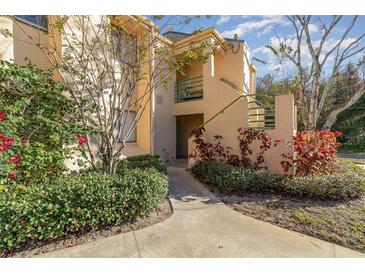 Building exterior showing entrance and landscaping at 4392 S Lake Orlando Pkwy # 4, Orlando, FL 32808