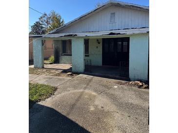 Ranch style home with covered porch and needs renovation at 1804 Mable Butler Ave, Orlando, FL 32805
