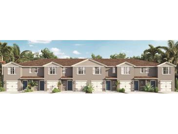 Modern three-unit townhome building with attached garages and neutral color palette at 2917 Hudson Hammock Way, Saint Cloud, FL 34773