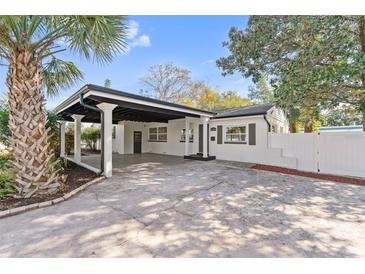 Updated home exterior boasts carport and charming curb appeal at 2800 E Anderson St, Orlando, FL 32803