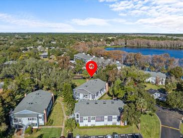Aerial view of condo community near lake at 604 Northlake Dr, Sanford, FL 32773