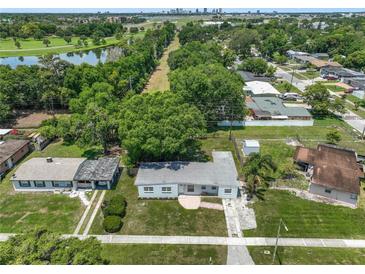 Aerial view showing the house and surrounding neighborhood at 124 Mercado Ave, Orlando, FL 32807