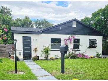 Charming bungalow with modern exterior and landscaping at 631 Callahan St, Winter Park, FL 32789