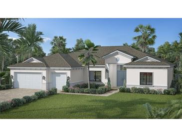 Single-story home with two-car garage and landscaped yard at Lot 06 Yellowleaf Circle, Orlando, FL 32820