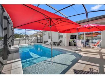 Inviting screened pool with plenty of space for lounging at 2950 Sonata Ct, Saint Cloud, FL 34772