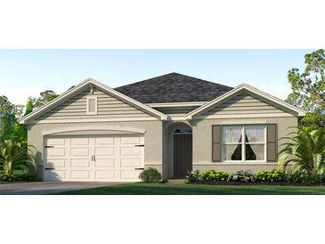 One-story home with a two-car garage and landscaped front yard at 3523 Sandalwood Isle Way, Ocoee, FL 34761