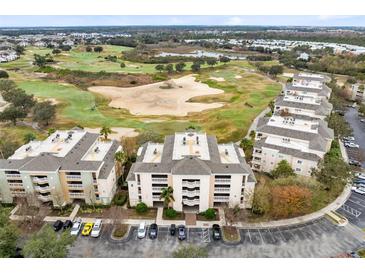 Aerial view of condo community near golf course at 1368 Centre Court Ridge Dr # 104, Reunion, FL 34747