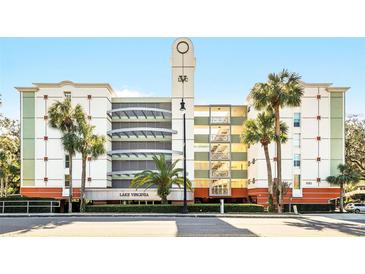 Lake Virginia building exterior, featuring attractive architecture and landscaping at 690 Osceola Ave # 209, Winter Park, FL 32789