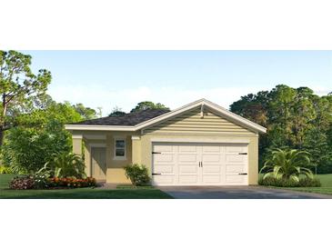 One-story house with a two-car garage and landscaped front yard at 1597 Bull Hill Rd, Kissimmee, FL 34744