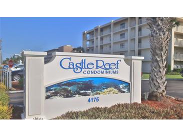 Castle Reef Condominium entrance sign, welcoming residents and guests to the community at 4175 S Atlantic Ave # 508, New Smyrna Beach, FL 32169