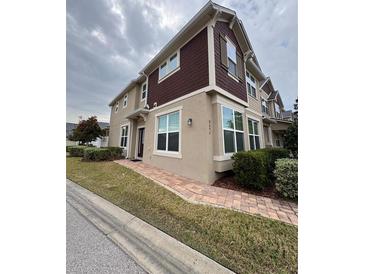 Two-story home with attractive exterior and landscaping at 8692 Wellington Blue Ln, Windermere, FL 34786