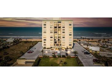 Oceanfront building, featuring ample parking and beautiful sunset views at 1513 Ocean Shore Blvd # 8F, Ormond Beach, FL 32176