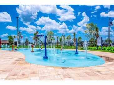 Fun spray park for with interactive water features at 3151 Paradox Cir # 405, Kissimmee, FL 34746