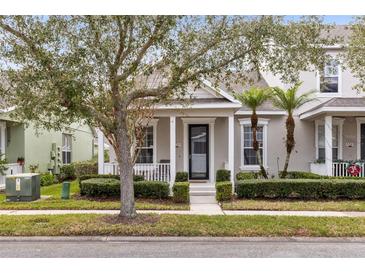 Charming Craftsman style home with front porch and well-manicured landscaping at 3721 Cleary Way, Orlando, FL 32828