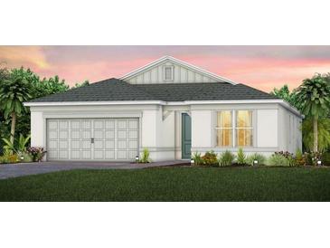 Two-story home with gray roof and white exterior at 2753 Redblush Ter, St Cloud, FL 34772