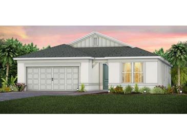 Beautiful single-story home with a two-car garage and well-manicured lawn at 2753 Redblush Ter, St Cloud, FL 34772